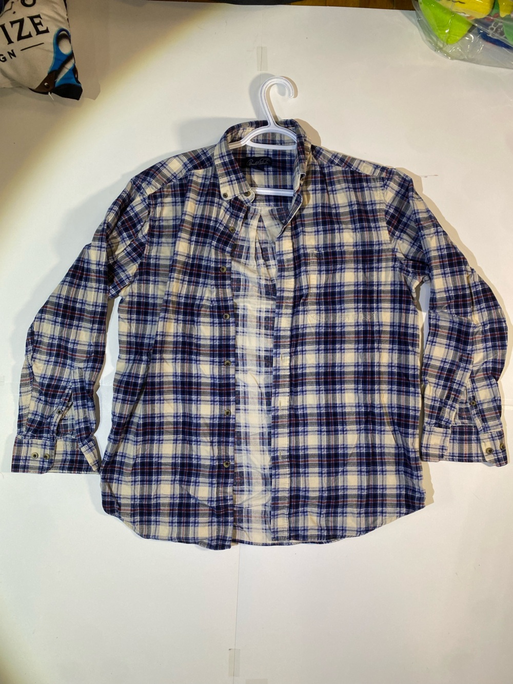 Arnold Palmer blue and white plaid button-up shirt in size M